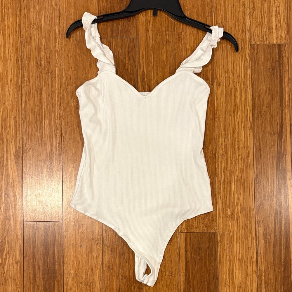 Francesca's Collections Ivory Ruffle Bodysuit